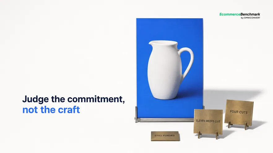 A straight-on studio photograph on a seamless white sweep of one plain unbranded printed poster proof standing upright in a slim steel easel, with a museum-style engraved spec plate on a low brass stand beside it and a second smaller plate behind